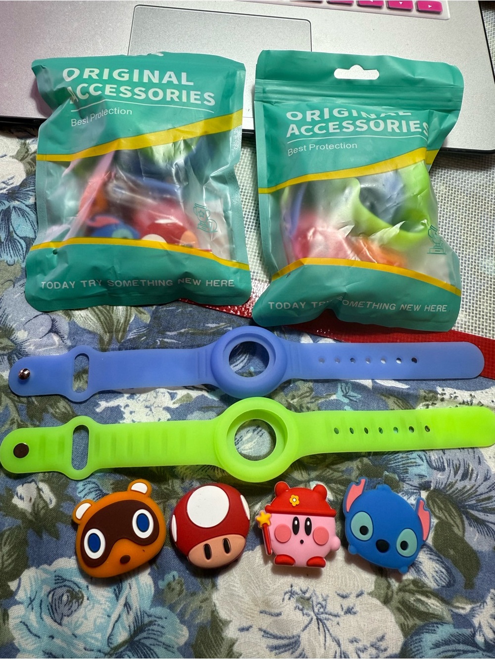 Silicone Kids airtag holders with Colorful Character Covers - Blue & Green